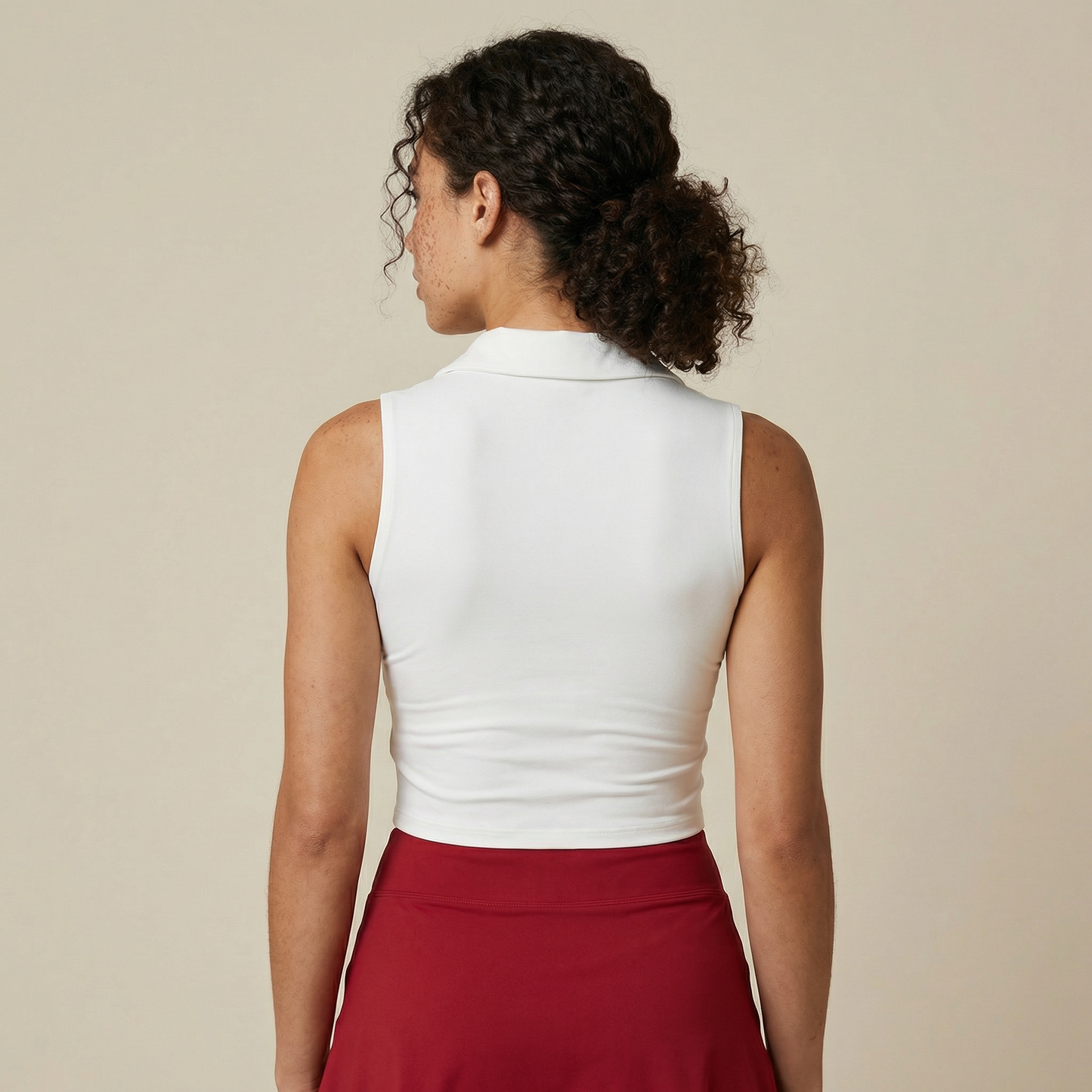 Back detail of white sleeveless performance tennis top – Scarlet Court Set by This Is Paria