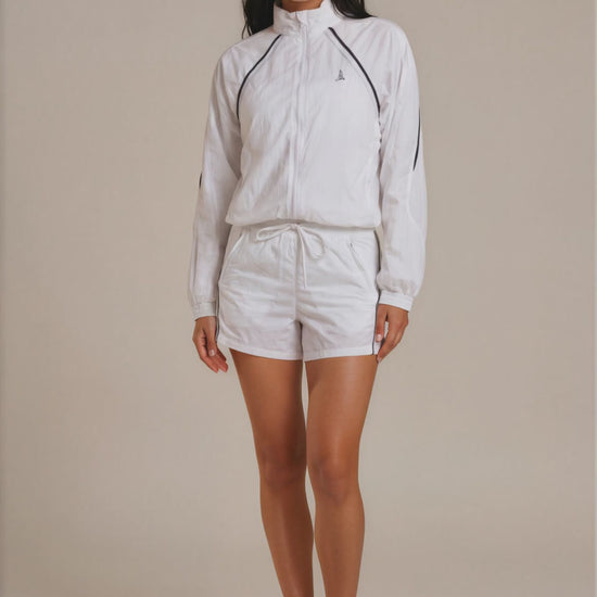 oman modelling the lightweight Aero Court Set in white for padel, tennis and lifestyle wear