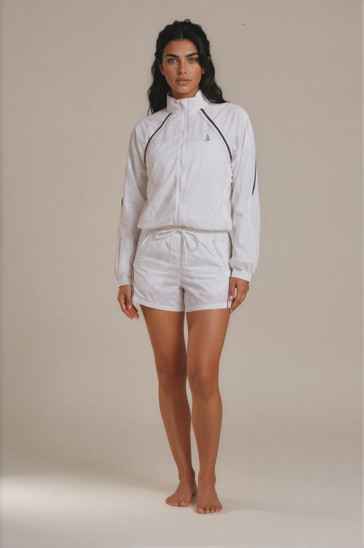 oman modelling the lightweight Aero Court Set in white for padel, tennis and lifestyle wear
